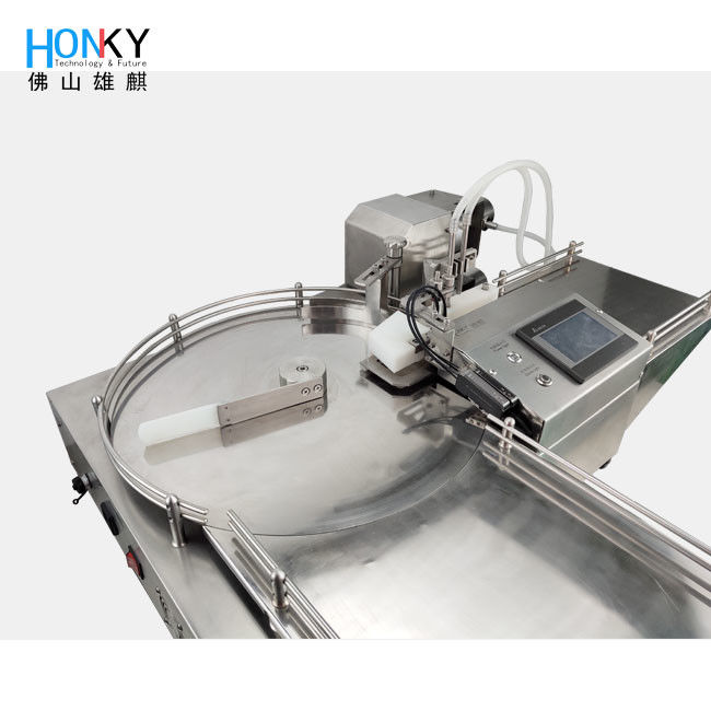 Desktop Double Head Glass Vial Filling Machine With Ceramic High Precision Pump For 4200 BPH Essential Oil Filling